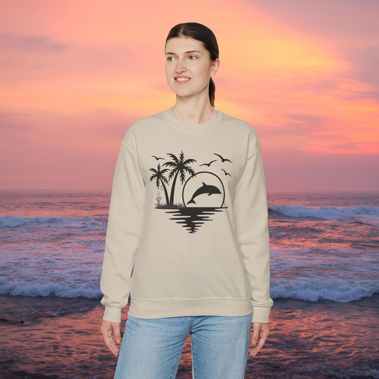 Silhouettes of palm trees, playful dolphin, and the ocean water make this cozy sweatshirt. Give the gift of this Unisex Heavy Blend™ Crewneck Sweatshirt or get one for yourself.