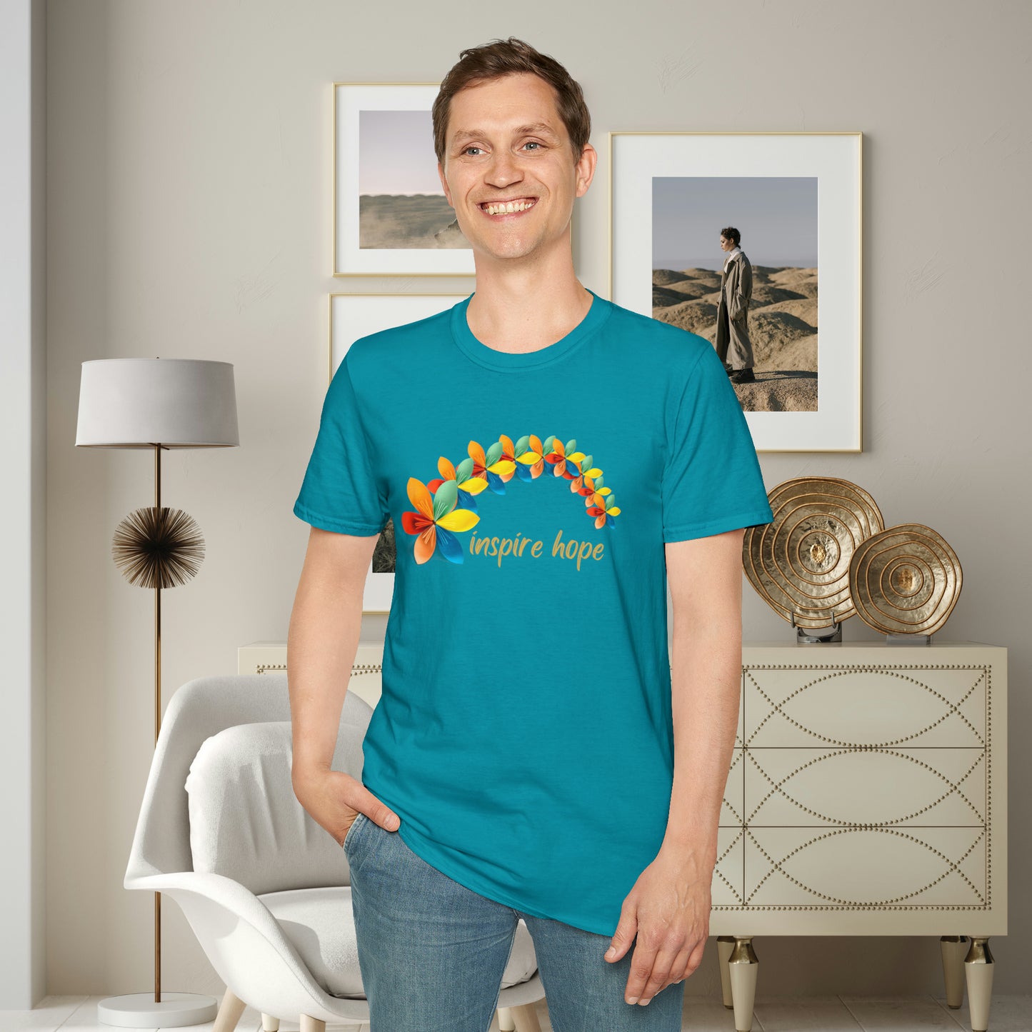 A beautiful origami style flowers in rainbow formation with “inspire hope” below it. We find hope in each other, that is part of our humanity. Be that inspiration, one person at a time. This is a Unisex Softstyle T-Shirt.