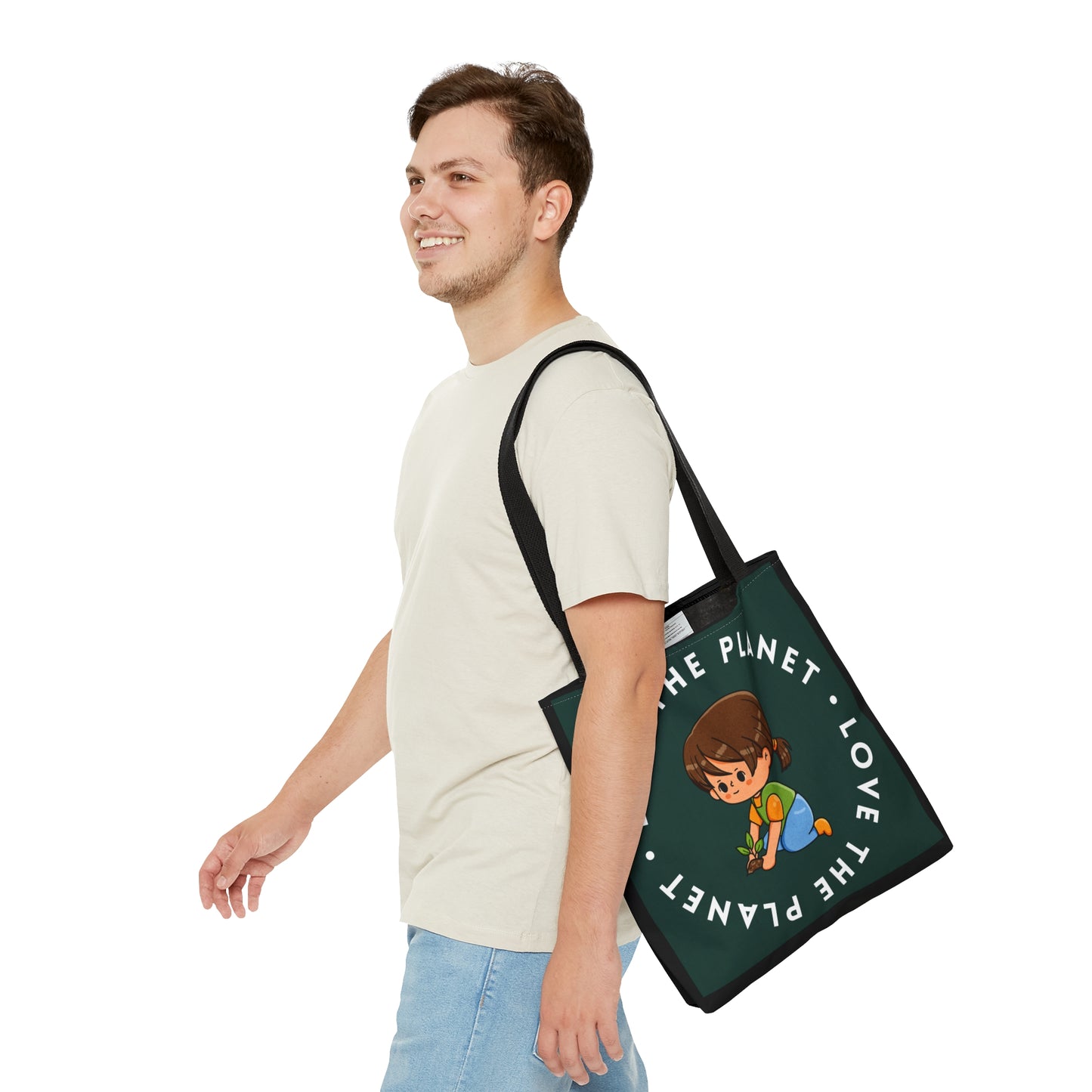 Caring kid planting a tree inside a  “LOVE THE PLANET” Tote Bag in 3 sizes to meet your needs. Available in black.