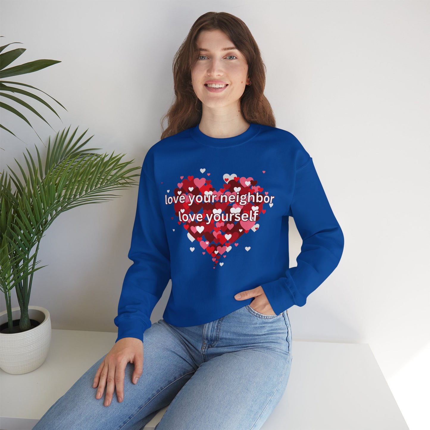 “love your neighbor love yourself” on top of a beautiful heart of hearts. Give the gift of this Unisex Heavy Blend™ Crewneck Sweatshirt or get one for yourself.