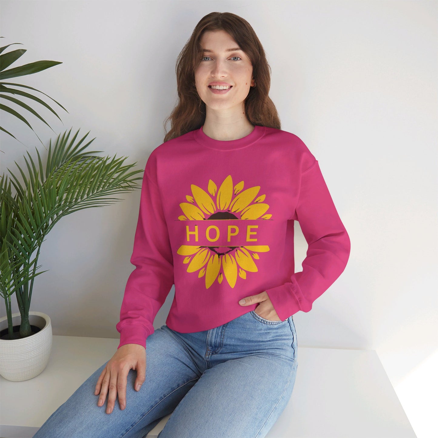 Beautiful sunflower with to inspire  “HOPE” comfy sweatshirt. Give the gift of this Unisex Heavy Blend™ Crewneck Sweatshirt or get one for yourself.