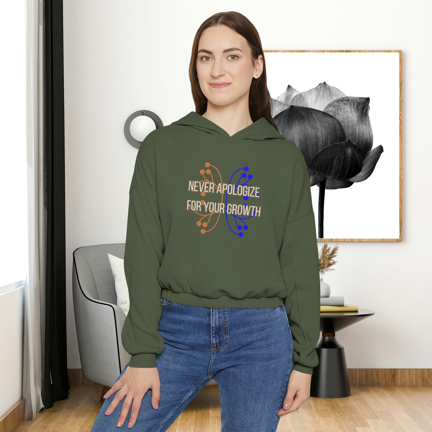 Never apologize for your growth is the message on this Women's Cinched Bottom Hoodie. Go and keep growing!