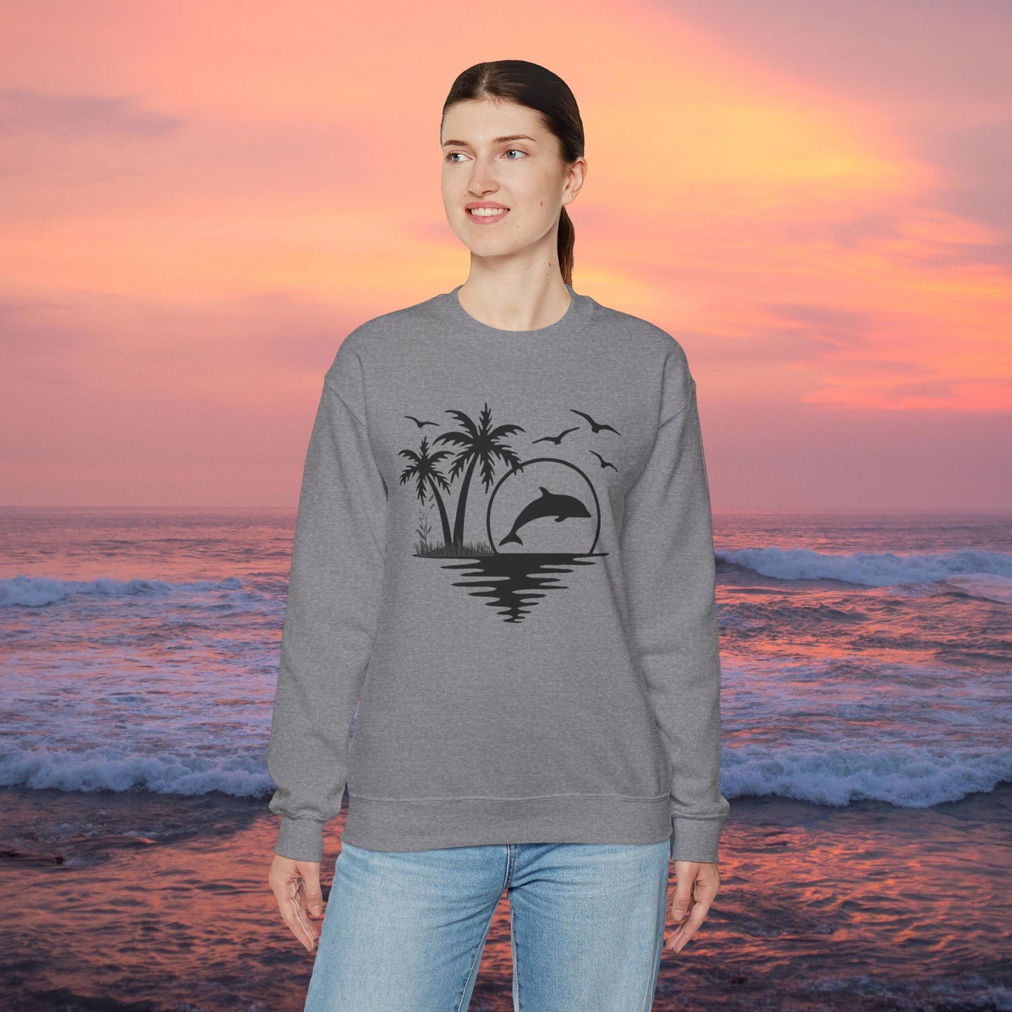 Silhouettes of palm trees, playful dolphin, and the ocean water make this cozy sweatshirt. Give the gift of this Unisex Heavy Blend™ Crewneck Sweatshirt or get one for yourself.