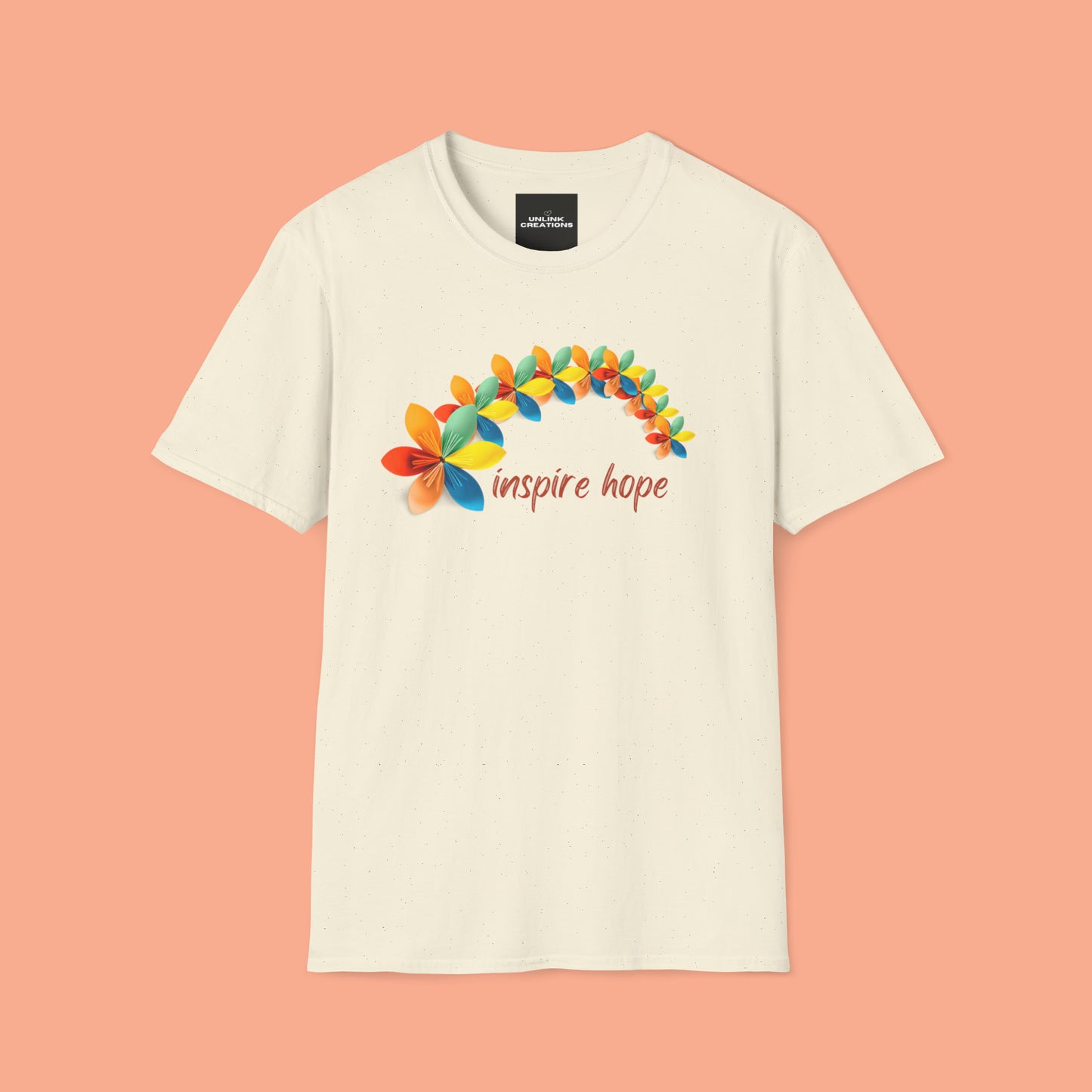 A beautiful origami style flowers in rainbow formation with “inspire hope” below it. We find hope in each other, that is part of our humanity. Be that inspiration, one person at a time. This is a Unisex Softstyle T-Shirt.