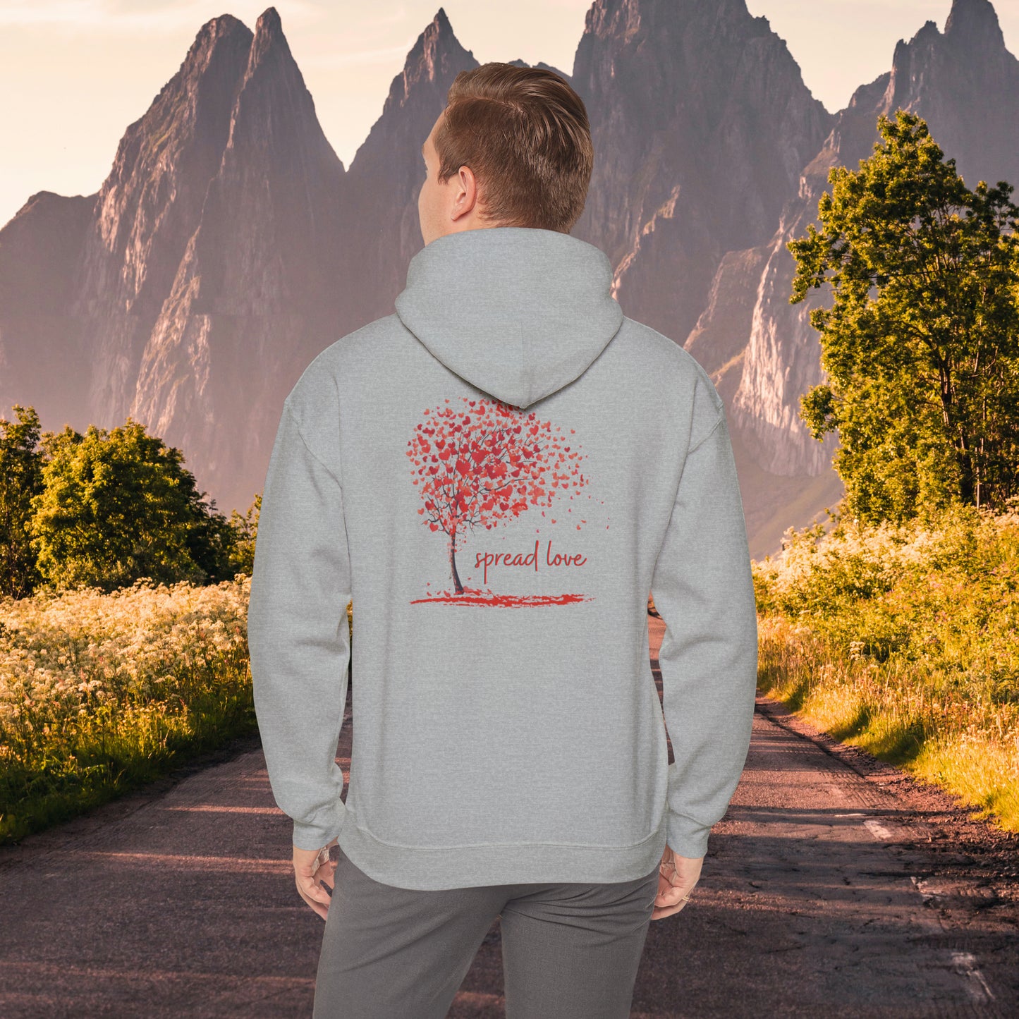 Spread love is the message on this heart filled tree designed Unisex Heavy Blend™ Hooded Sweatshirt