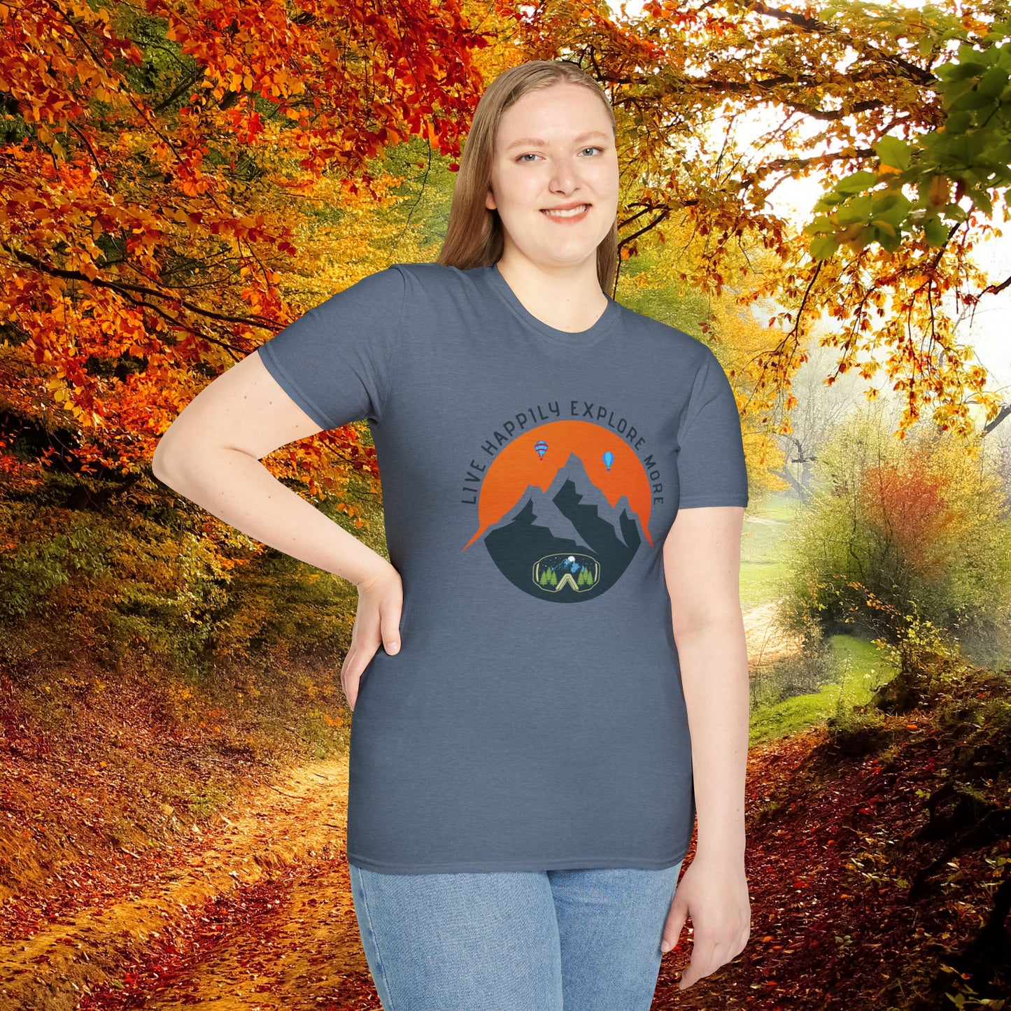 “LIVE HAPPILY EXPLORE MORE” message on this mountain sports inspired Unisex Softstyle T-Shirt.