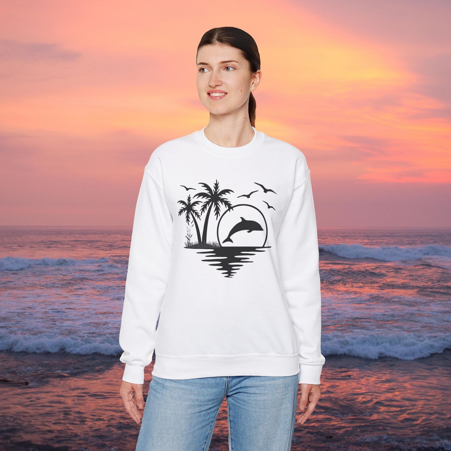 Silhouettes of palm trees, playful dolphin, and the ocean water make this cozy sweatshirt. Give the gift of this Unisex Heavy Blend™ Crewneck Sweatshirt or get one for yourself.