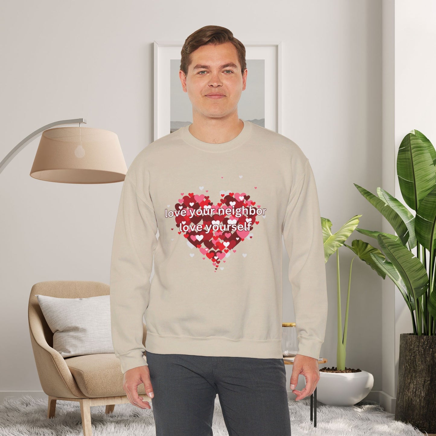 “love your neighbor love yourself” on top of a beautiful heart of hearts. Give the gift of this Unisex Heavy Blend™ Crewneck Sweatshirt or get one for yourself.