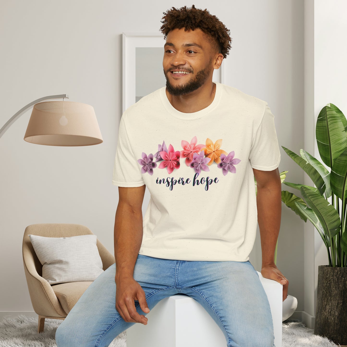 Our ability to “inspire hope” in others begins with us recognizing our ability to do so. Origami flowers go with this message on this Unisex Softstyle T-Shirt.