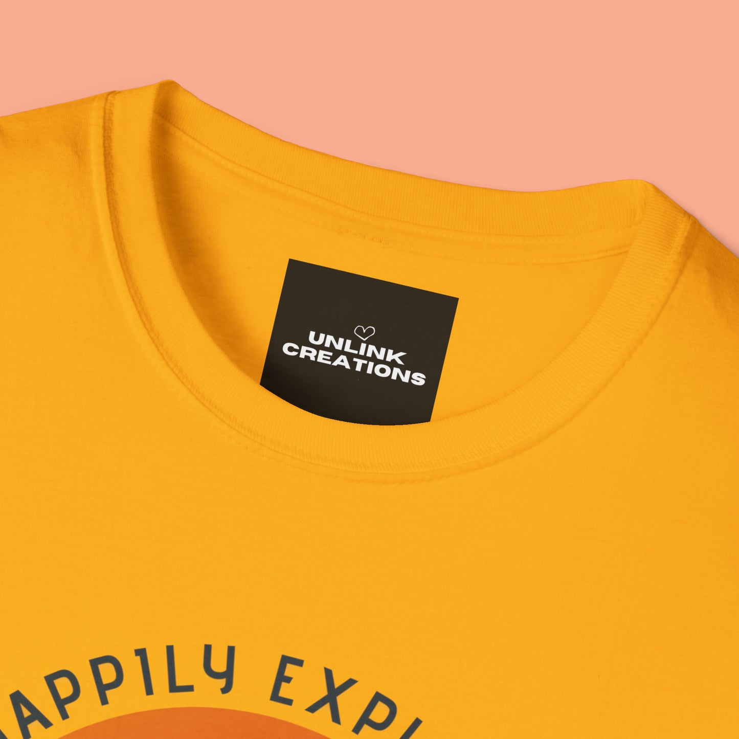 “LIVE HAPPILY EXPLORE MORE” message on this mountain sports inspired Unisex Softstyle T-Shirt.