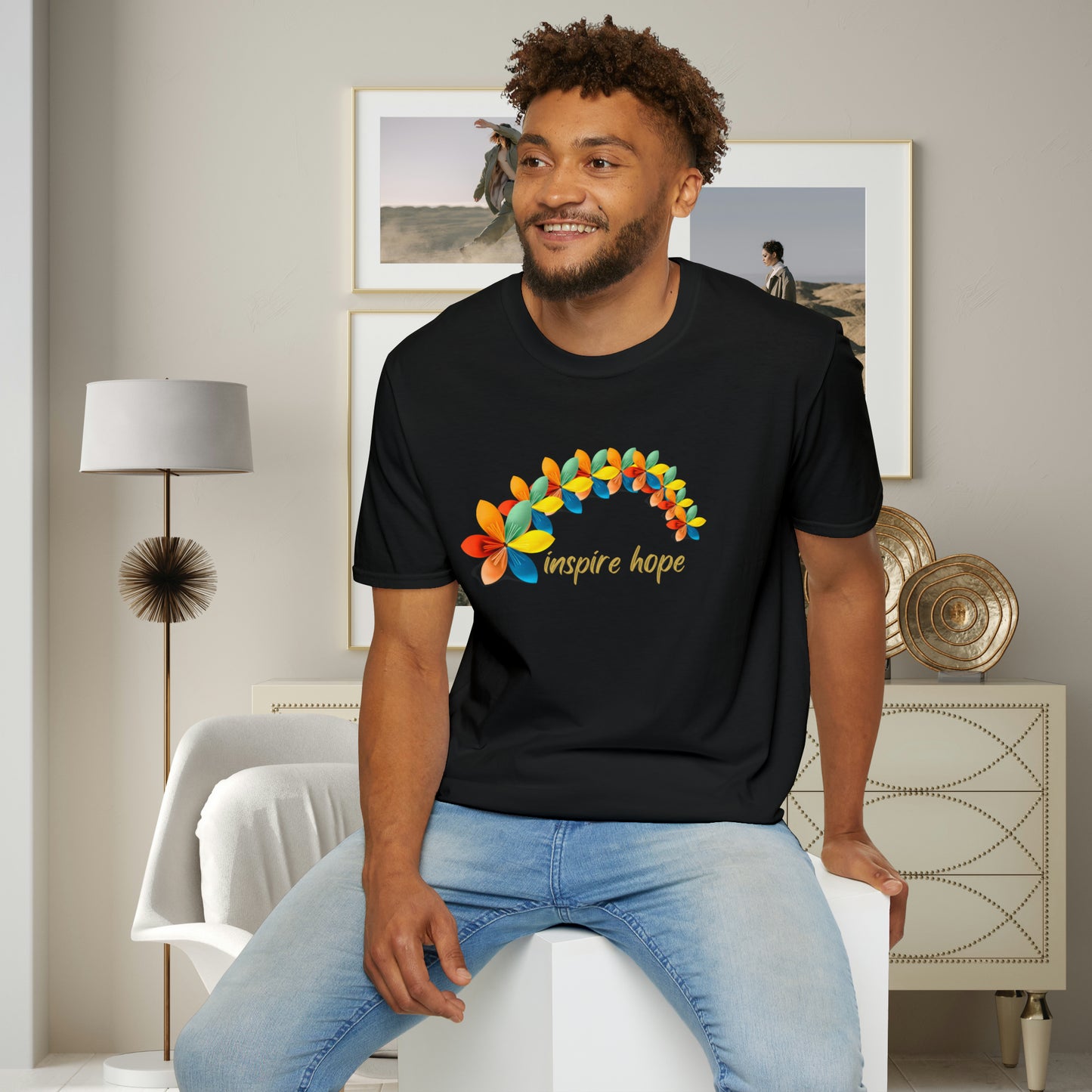 A beautiful origami style flowers in rainbow formation with “inspire hope” below it. We find hope in each other, that is part of our humanity. Be that inspiration, one person at a time. This is a Unisex Softstyle T-Shirt.