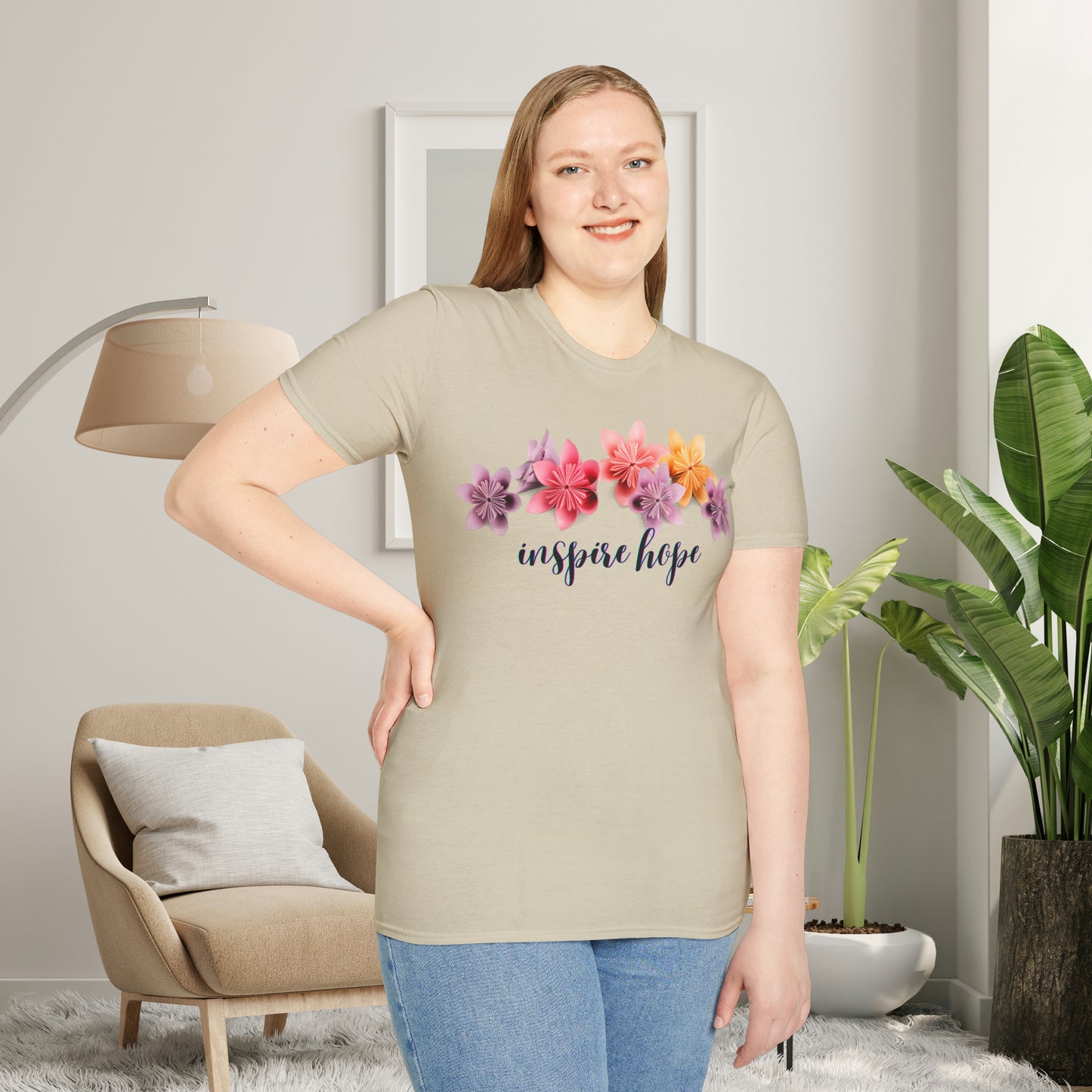 Our ability to “inspire hope” in others begins with us recognizing our ability to do so. Origami flowers go with this message on this Unisex Softstyle T-Shirt.