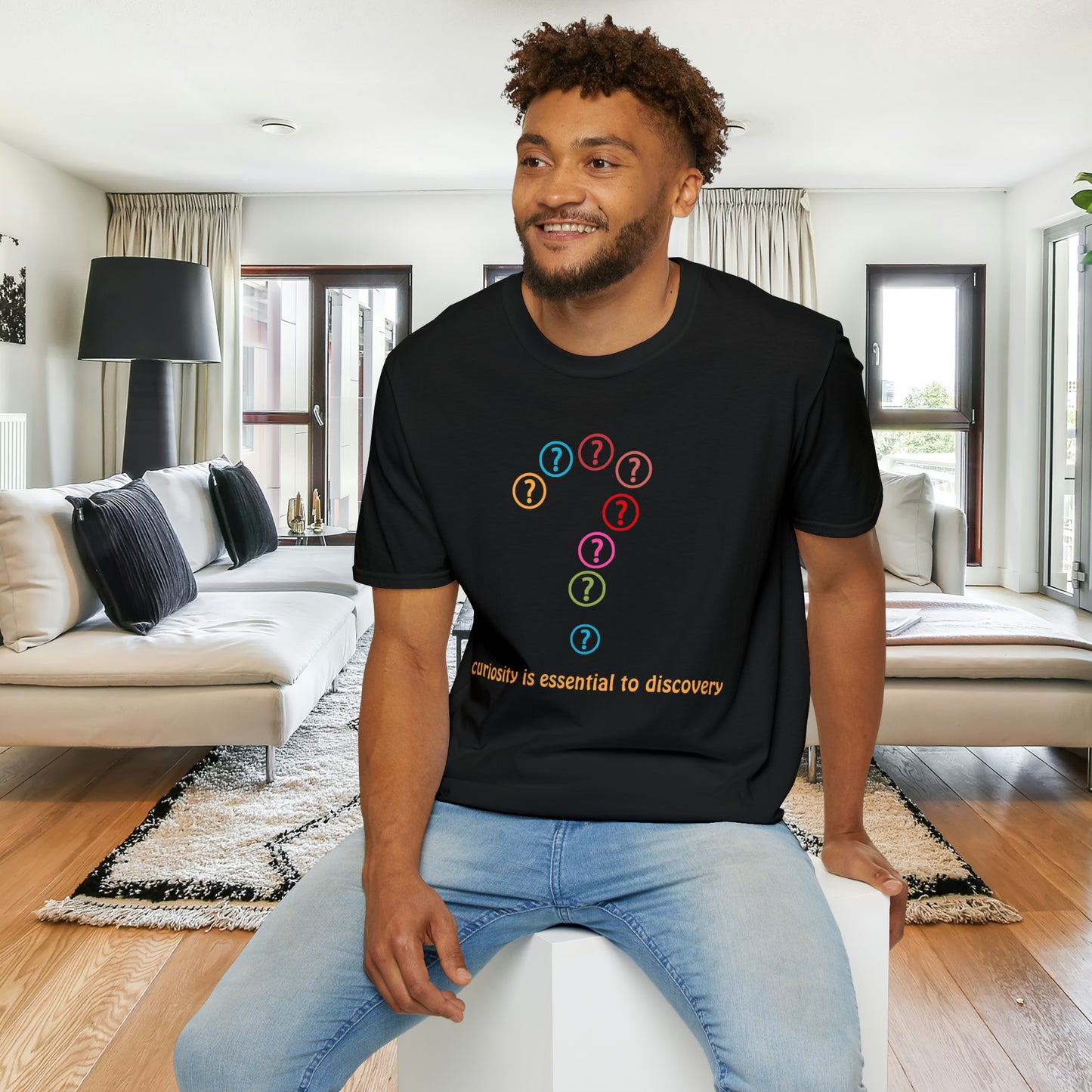 A question mark made of question marks above “curiosity is essential to discovery” message design on this Unisex Softstyle T-Shirt design.