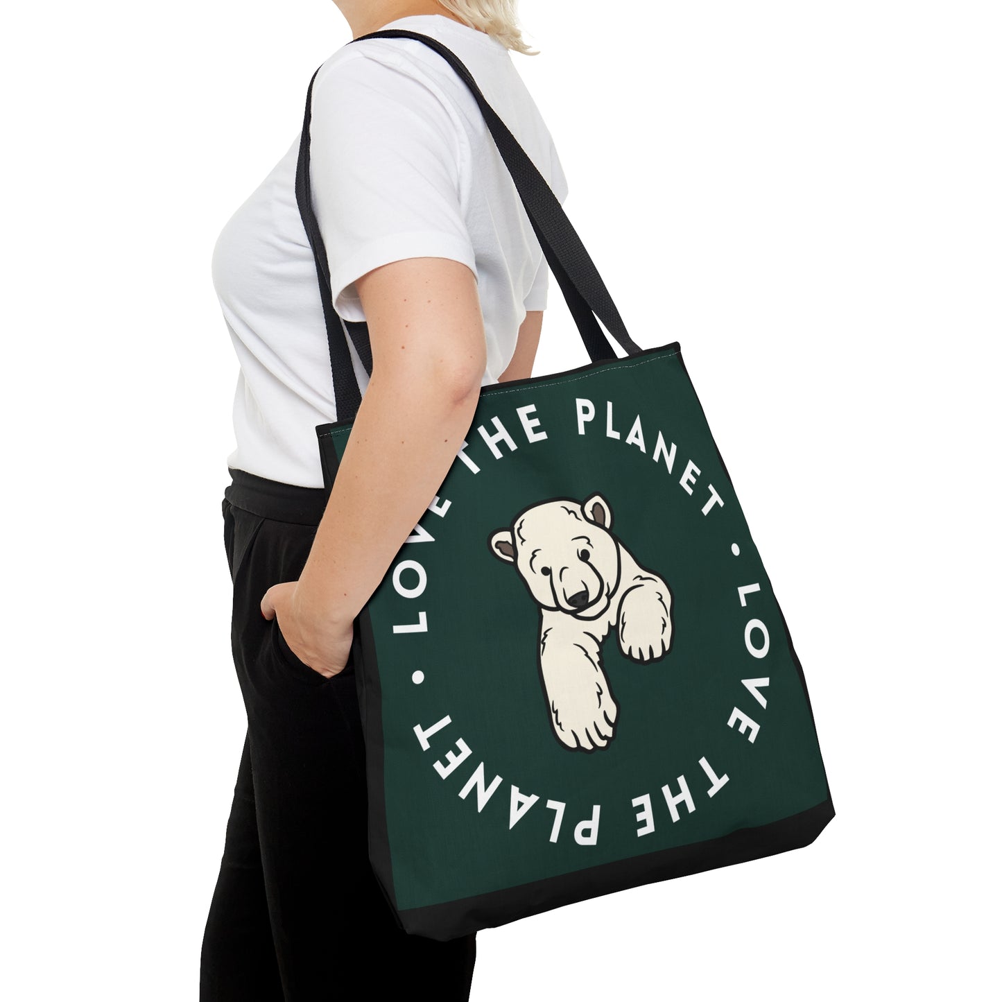 Polar bear inside a  “LOVE THE PLANET” Tote Bag in 3 sizes to meet your needs. Available in black.