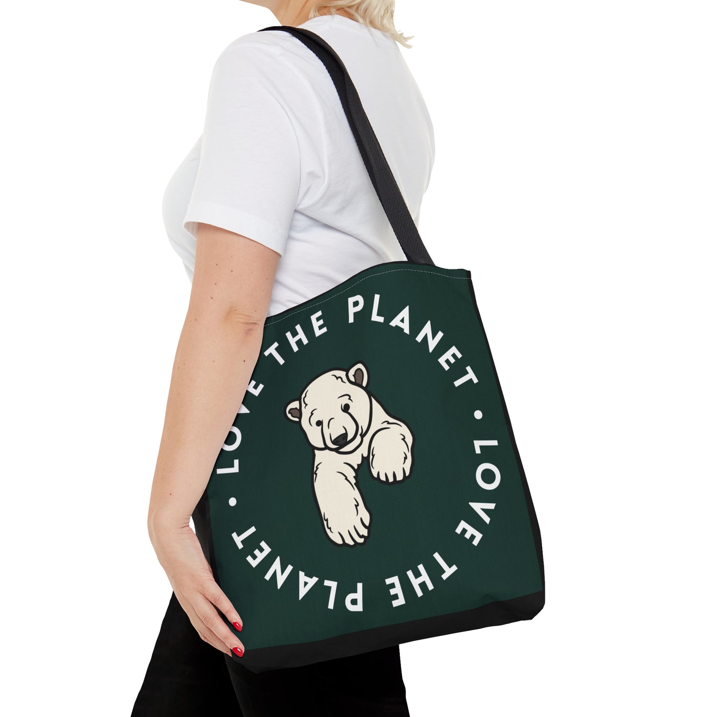 Polar bear inside a  “LOVE THE PLANET” Tote Bag in 3 sizes to meet your needs. Available in black.