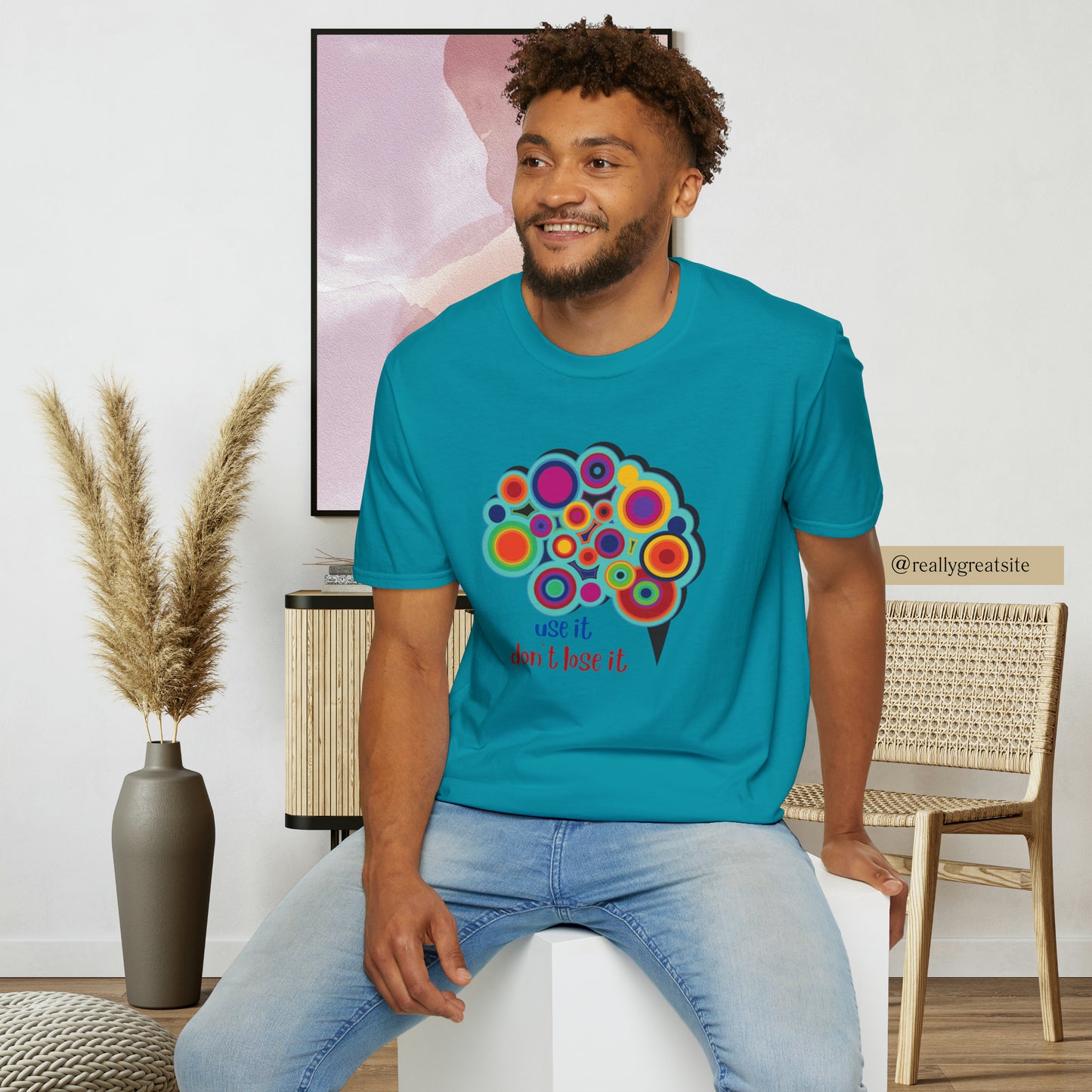 Beautifully designed brain with “use it don’t lose it” message below it on this Unisex Softstyle T-Shirt.