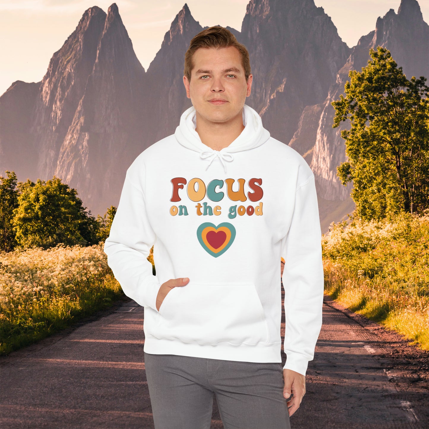 A colorful Focus on the good message on this Unisex Heavy Blend™ Hooded Sweatshirt