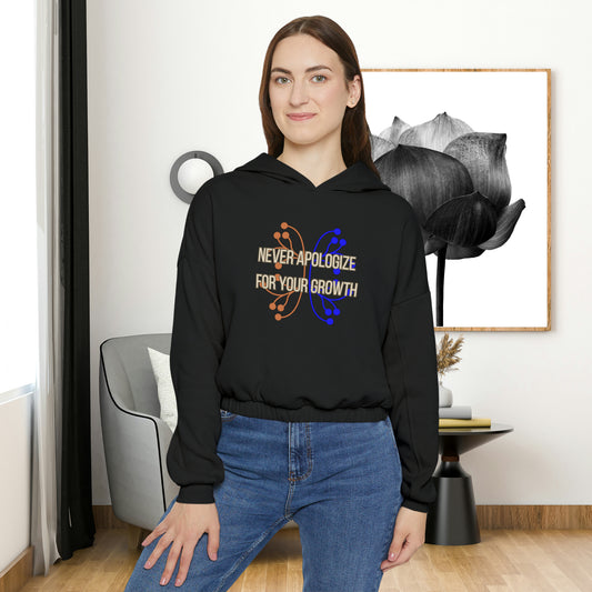 Never apologize for your growth is the message on this Women's Cinched Bottom Hoodie. Go and keep growing!