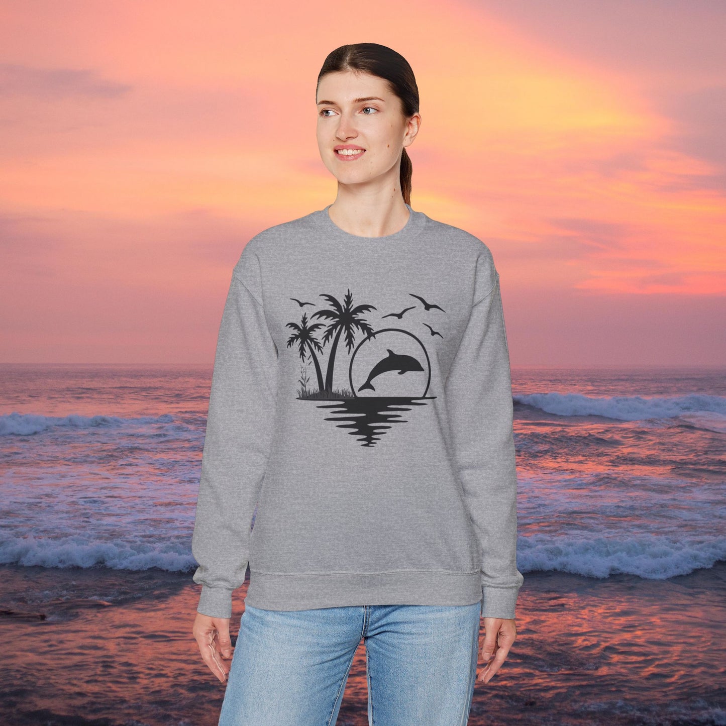 Silhouettes of palm trees, playful dolphin, and the ocean water make this cozy sweatshirt. Give the gift of this Unisex Heavy Blend™ Crewneck Sweatshirt or get one for yourself.