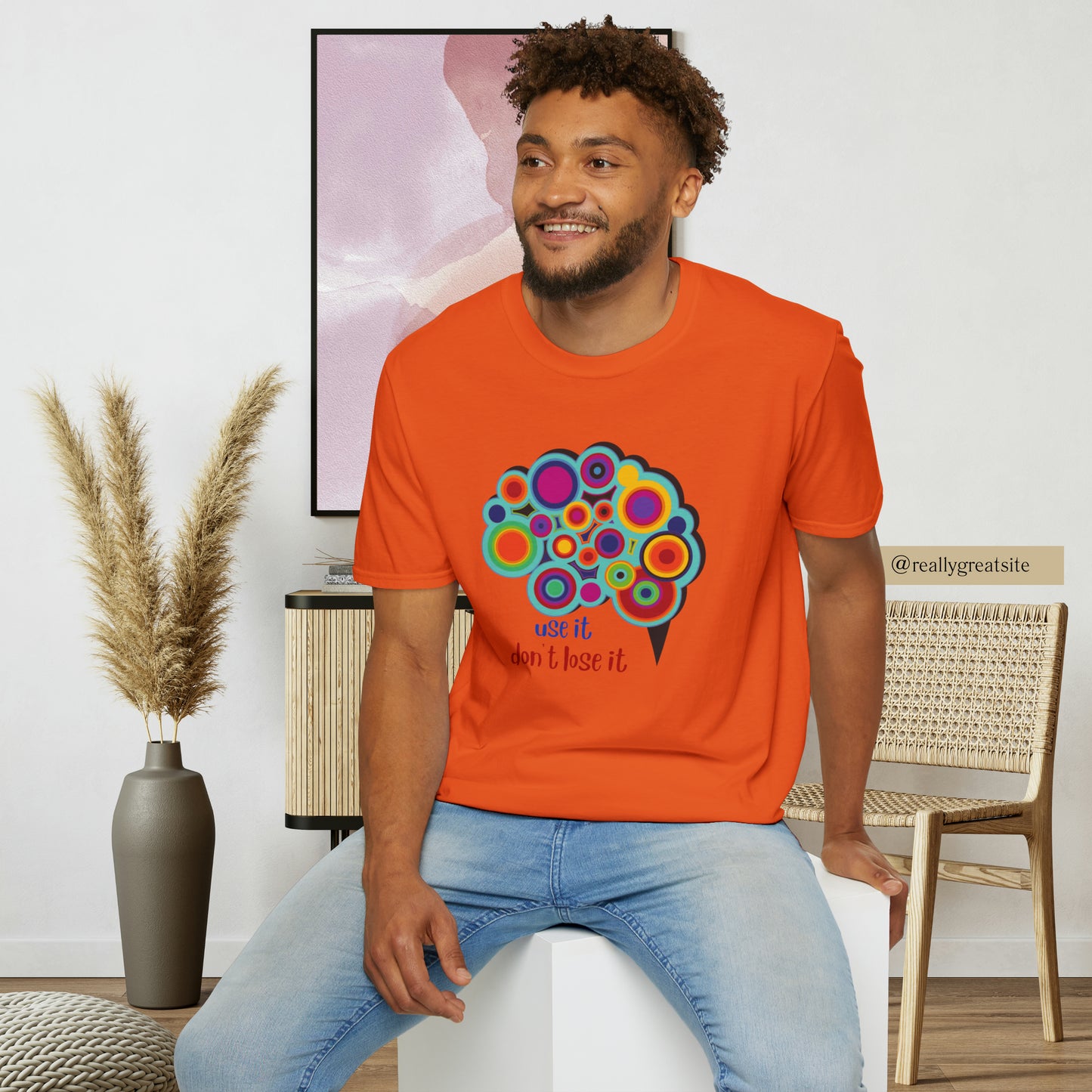 Beautifully designed brain with “use it don’t lose it” message below it on this Unisex Softstyle T-Shirt.