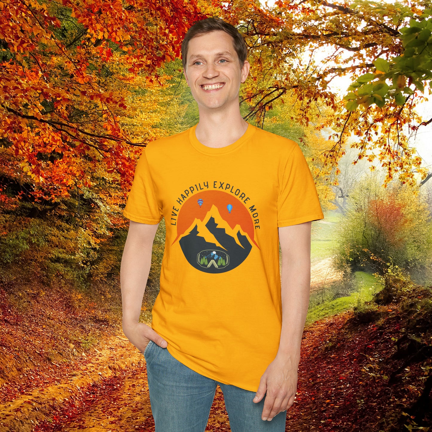 “LIVE HAPPILY EXPLORE MORE” message on this mountain sports inspired Unisex Softstyle T-Shirt.